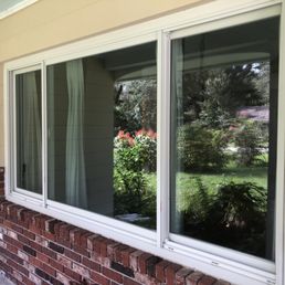 Freshly cleaned sliding windows on a home exterior